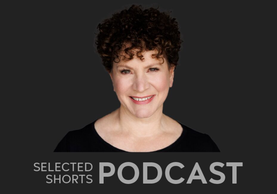 Susie Essman, a woman pictured from the shoulders up is smiling at the camera, has short, curly red hair