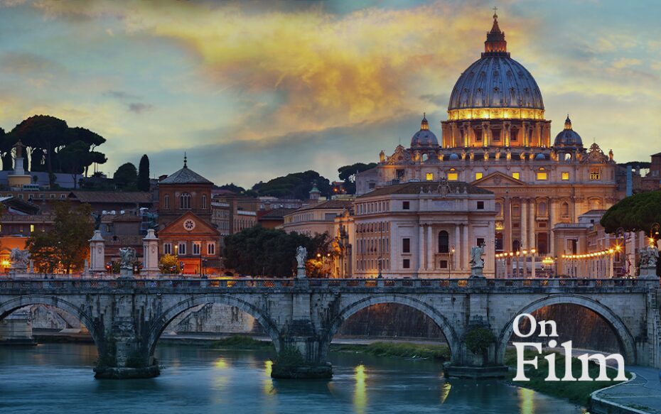 Saint Peter’s Basilica and its surroundings. Its lights are reflecting in the river.