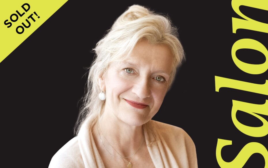 In front of a black background, Elizabeth Strout stands next to the word 'Salon.' In the top left corner it says, "sold out."