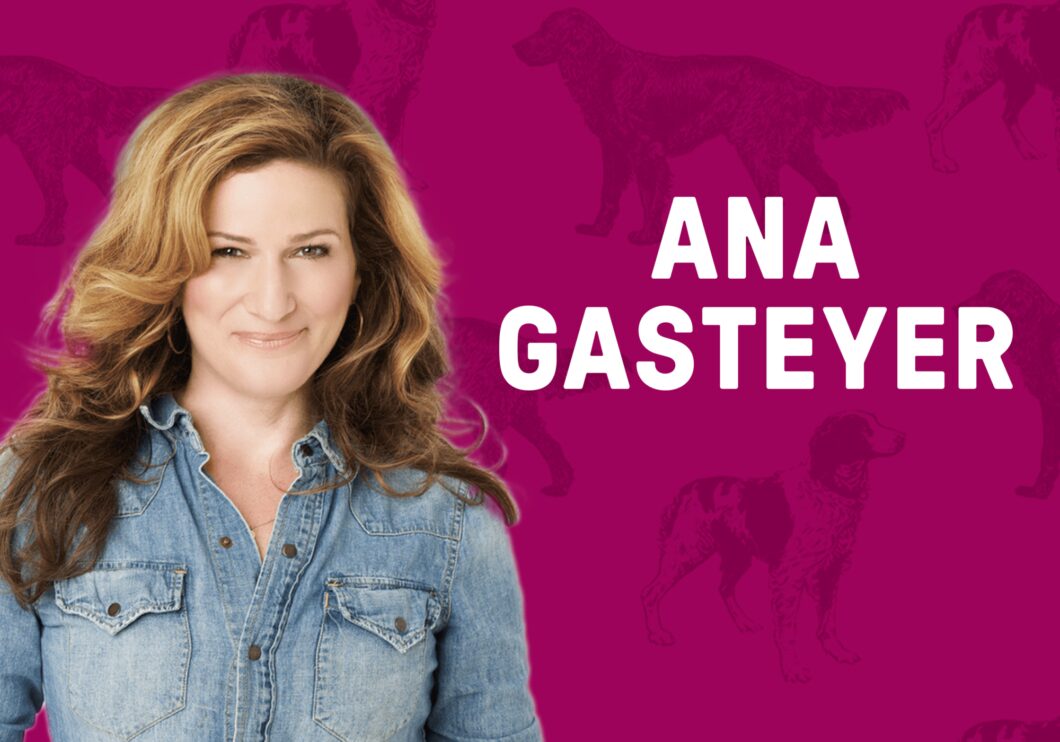 Against a purple background, patterned with silhouettes of dogs: a headshot of the actress Ana Gasteyer. The actress's name appears in white text on the right-hand side of the image.