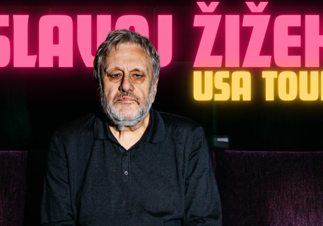 Philosopher Slavoj Zizek sits on a maroon couch and black background. His name appears in neon pink font behind his head.
