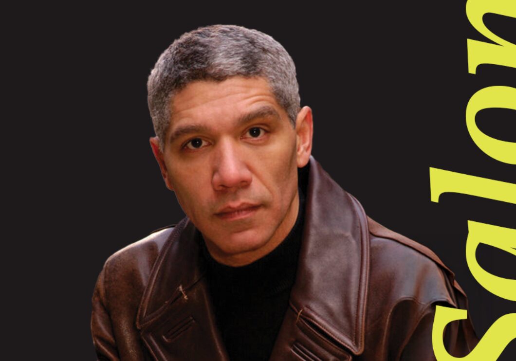 With a black background, Peter Francis James stands next to the text 'Salon.'