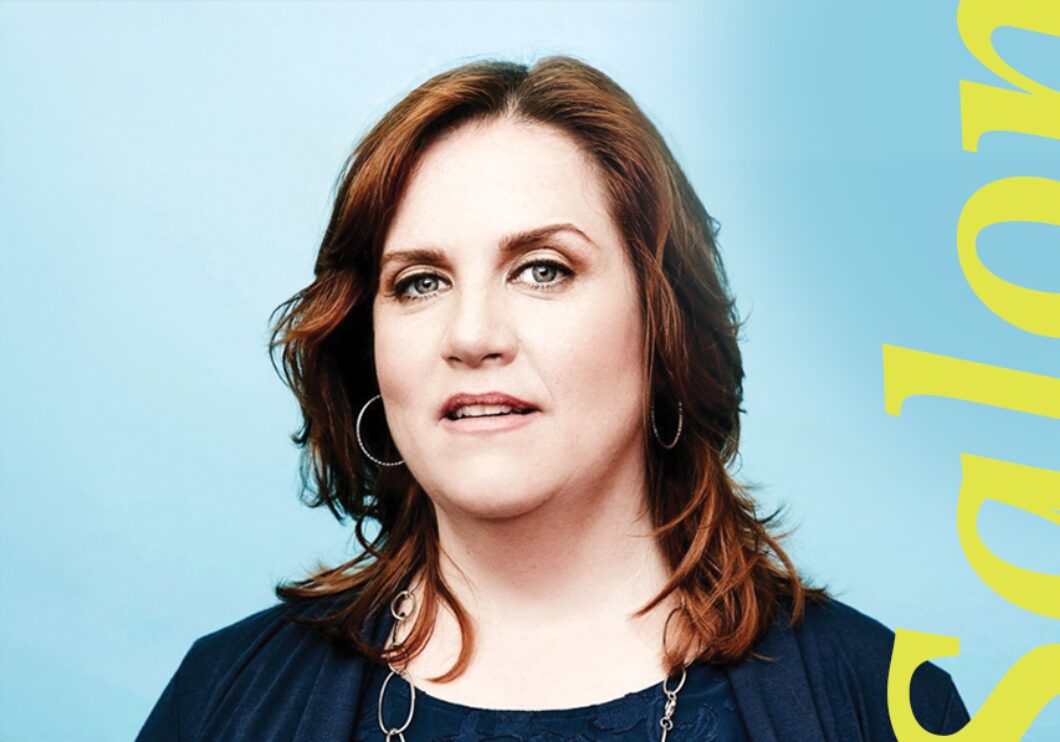 In front of a blue background, Donna Lynne Champlin stands next to the word 'Salon.'