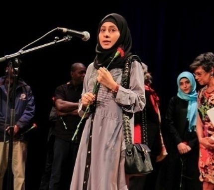 A young woman in hijab participates in Symphony Space's All Write! program.